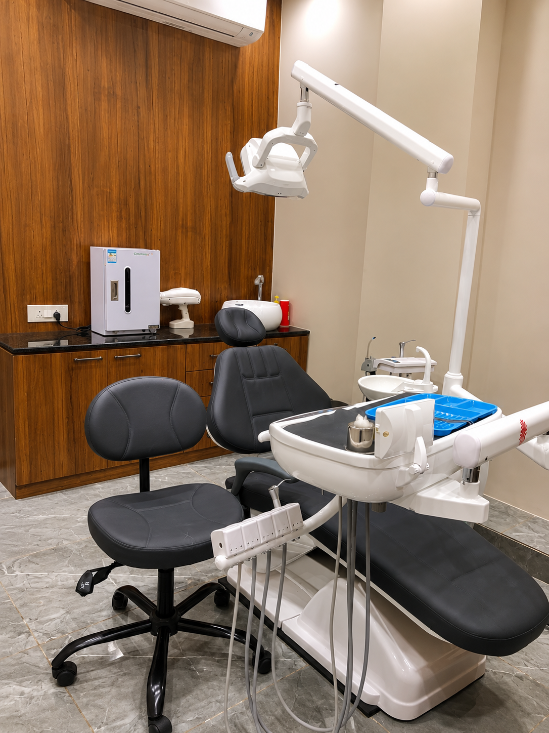 Side view of treatment room equipment and chair